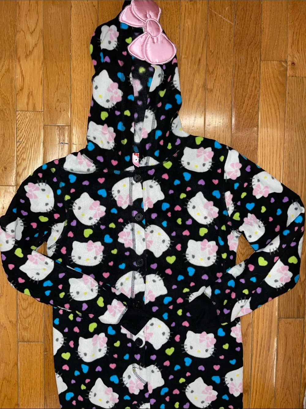 Hello Kitty Black Fleece Hooded Pajama Onesie with Pink Bow Accents